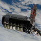 The Cygnus cargo craft is pictured moments after being captured with the Canadarm2 robotic arm controlled by NASA astronaut Nicole Mann